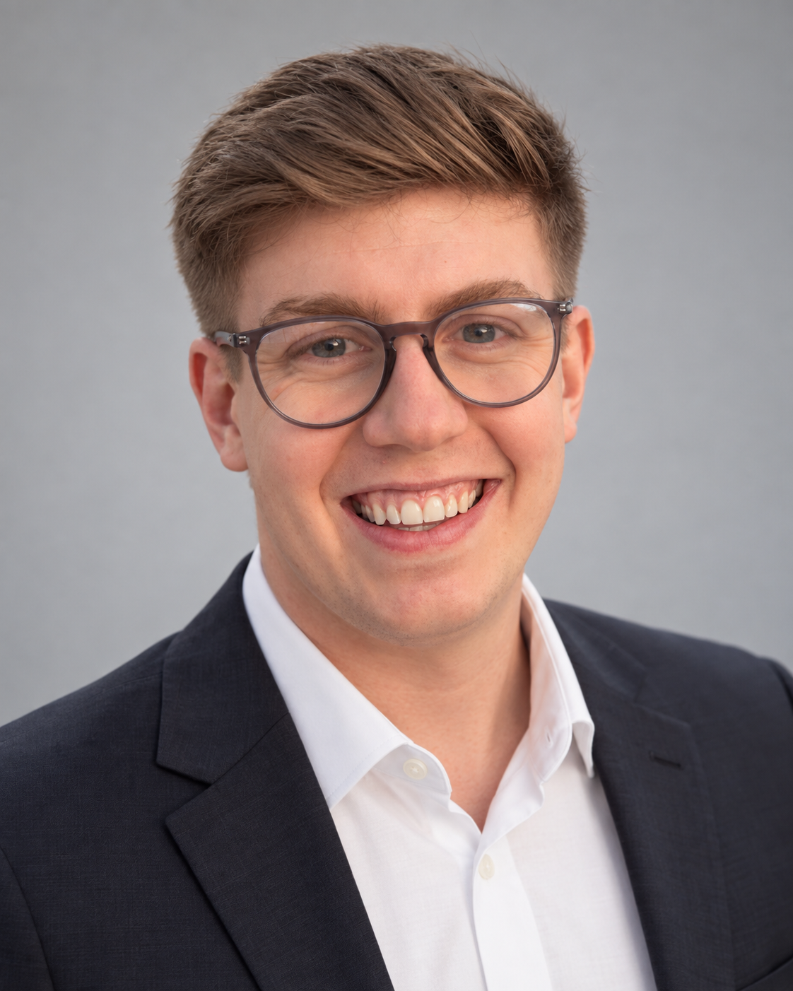 Professional headshot of Nick Fisher, founder of Passive Acquisition